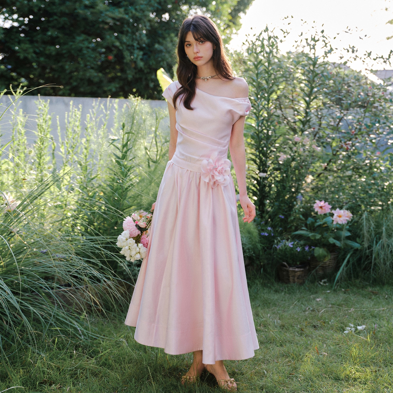 Marc Moore French-Style One-Shoulder Pink Satin Dress with Three-Dimensional Floral Embellishments, Cinched Waist, and Long Flared Skirt Marc Moore French-Style One-Shoulder Pink Satin Dress with Three-Dimensional Floral Embellishments, Cinched Waist, and Long Flared Skirt