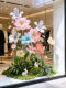 Spring-Themed Decoration Setup in the Mall, Monet Garden Landscaping, Flower-Shaped Ambiance, Indoor Giant Flower Bouquet Display