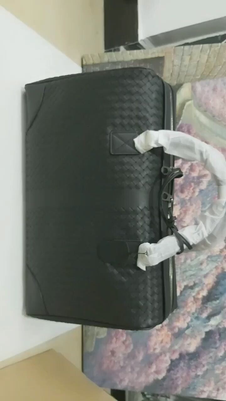 2022 new fetal cowhide woven men's portable travel bag casual leather fashion business bag business trip luggage bag