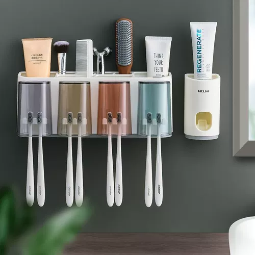 Зубная щетка установила стойку с отверстиями и чашкой для жидкой чашки для размалывания