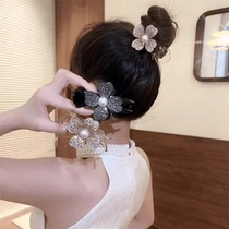 Super shiny four-leaf flower ball head grabber female high ponytail hairpin anti-collapse fixed hairpin temperament hair accessory