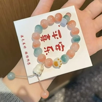 Двухцветный браслет в виде пьяной кошачьей лапы с цветком спереди