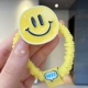 Желтый большеглазый смайлик желтое кольцо для волос