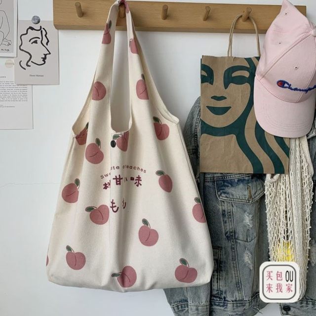 Niche design summer bag canvas ins Korean style ຂະ​ຫນາດ​ນ້ອຍ​ຄວາມ​ອາດ​ສາ​ມາດ​ອອກ​ໄປ​ຖົງ​ຂະ​ຫນາດ​ນ້ອຍ canvas ການ​ເດີນ​ທາງ​ແບບ​ເກົາ​ຫຼີ​