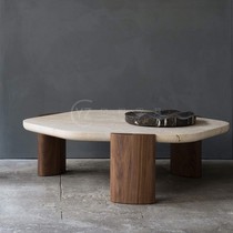 The design of the simple round white wax wood tea table in Nordic natural cave coffee table tea table