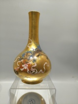 Yongzheng gold base enamel lion rolling hydrangea vase in the Qing Dynasty