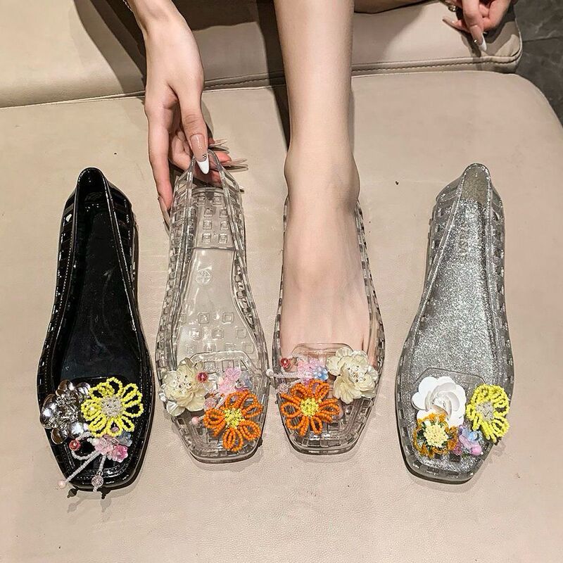 Korean Jelly Shoes 2026 Summer New Fashion Casual Transparent Floral Decoration Flat Crystal Sandals for Women Commuting Korean Jelly Shoes 2026 Summer New Fashion Casual Transparent Floral Decoration Flat Crystal Sandals for Women Commuting