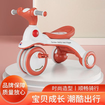 Childrens three-wheeler trolley trolley baby footboard car with music male and female baby light foot pedal car