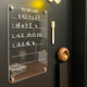 Erasable entrance door magnetically absorbed transparent message board