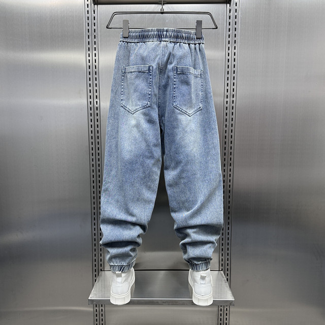 Pants 2024 ພາກຮຽນ spring overalls ຍີ່ຫໍ້ trendy ຂອງຜູ້ຊາຍ splicing ລ້າງໄວຫນຸ່ມຂາຜູກ elastic waist harem pants ຜູ້ຊາຍ