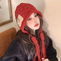 Live broadcast popular red hat for women in autumn and winter warm woolen hat with tassels knitted hat hand-knitted ear protection hat for women