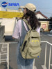 Nasa Co-Branded School Bag, Korean Version, Large Capacity, Lightweight, Burden-Reducing Backpack, Simple Backpack for College Students, High School and Junior High School Students