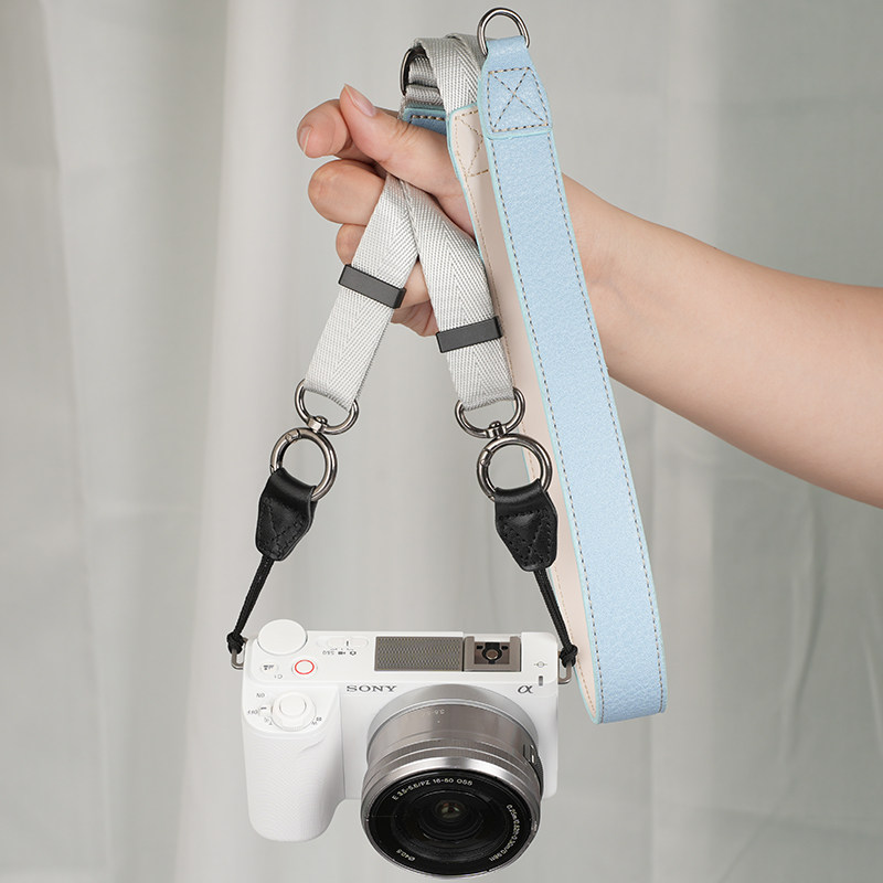 キヤノンR50、R10、ソニーZV10、富士フイルムXT30、XT5、Z30に対応したカメラストラップ（クイックリリース式）。