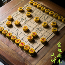 Bendelass high-end Chinese chess Kowloon carved golden nanmu solid wood small leaf Zhennan with chess board as a gift