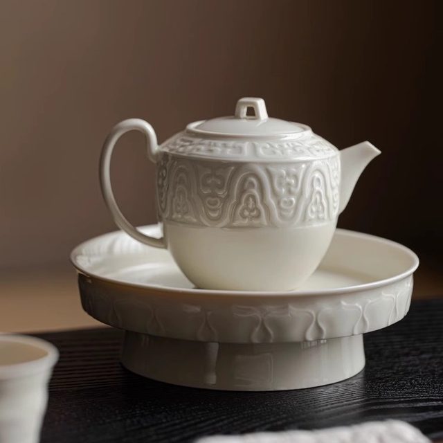 Ding kiln white teapot for tea making household high-end ceramic tea water separation small single pot kung fu tea set 2026 new style
