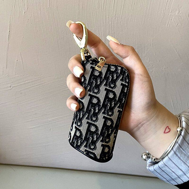 Key Pack woman 2023 new lock spoon bag containing bag Divine Instrumental Carry-on bag-Taobao with a small bag-Taobao