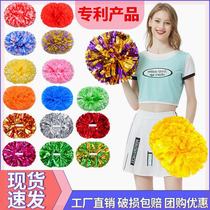 Autumn sports games cheerleaders holding flower balls in hand cheerleaders holding sequined flower sticks cheerleaders holding flower balls dancing sticks