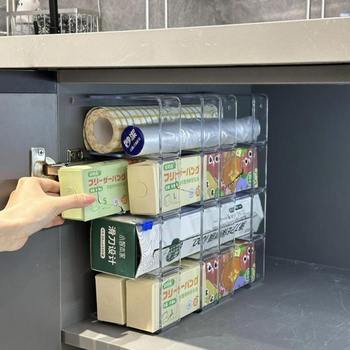 Plastic film storage artifact sorting rack thermos cups placed in cabinet kitchen storage rack plastic storage box debris