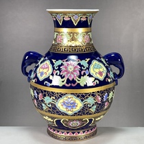 Collection of antique and second-hand porcelain. Returned overseas. Qianlong imperial blue background double elephant ear vase ornament with floral pattern.