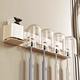 Mouthwash cup brush cup rack milk storage bathroom hole-free toothbrush storage rack wall hanging white electric