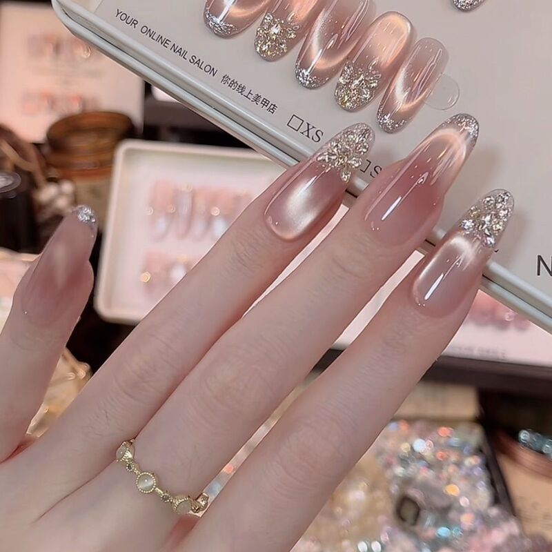 Regretfully, the Pure Handmade French-Style Wearables with a Dazzling Cat-Eye Effect Create a High-End Nail Art Look That Enhances Skin Tone and Makes Nails Appear Whiter. 32 Regretfully, the Pure Handmade French-Style Wearables with a Dazzling Cat-Eye Effect Create a High-End Nail Art Look That Enhances Skin Tone and Makes Nails Appear Whiter. 32