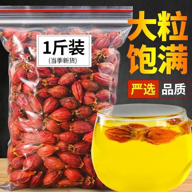 収穫したばかりのクチナシの実とクチナシの花のお茶。食用煮込み肉の色付けに使用。大きな野生のクチナシの実、クチナシ茶、山クチナシ茶。