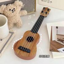 When you get bored practice piano and singing. You can play the medium ukulele. Toy small guitar simulated musical instrument.