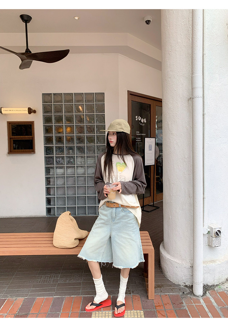 Стильные женские джинсы средней длины с эффектом потертости 牙套大汪