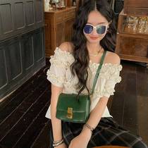 Xiao Renyis ear-shaped one-shoulder off-shoulder fashionable age-reducing top white short-sleeved shirt womens design niche short style