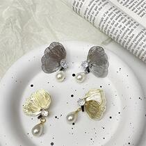 New Chinese style pearl butterfly earrings 2024 new earrings niche retro national style earrings