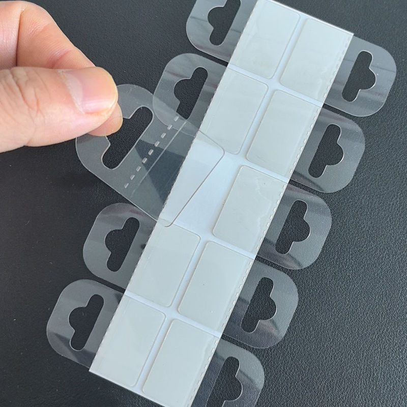 Direct Sale from Manufacturer: 3*4 Aircraft Hole Self-Adhesive Hooks, Eco-Friendly Adhesive Hanging Tabs, Transparent Pvc Plastic Sheet Hanging Clips