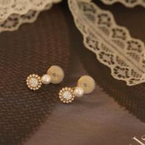 Compact commuting versatile pearl flower mosquito coil disc ear clip ins simple high-end design 925 silver needle earrings for women