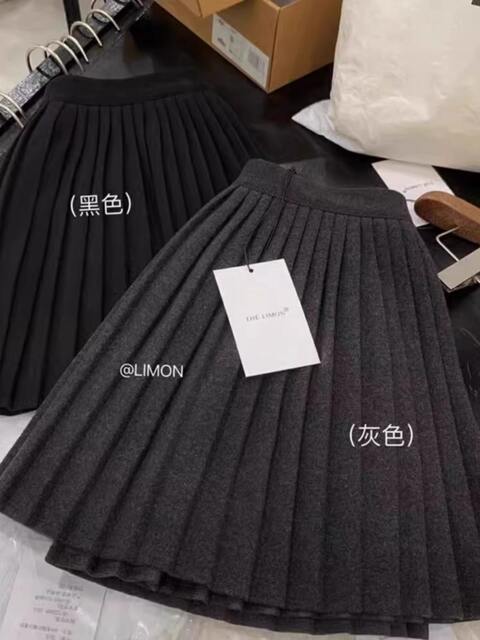 Pure lust-style hottie high-waisted A-line knitted woolen short skirt for women spring and autumn miu elastic waist bag hip half-length pleated skirt
