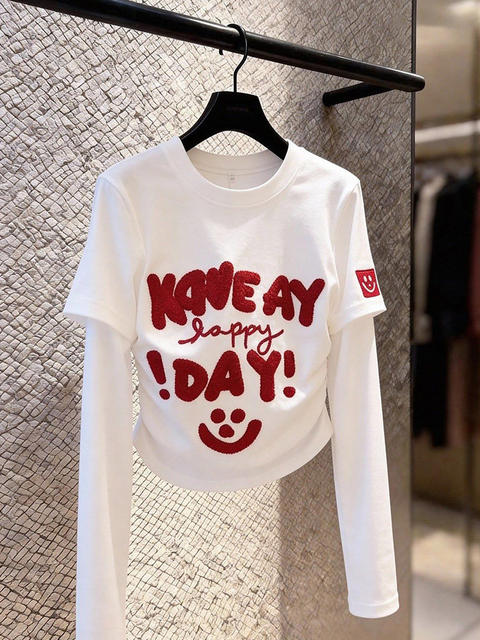 Niche non-contrasting white fake two-piece right shoulder long-sleeved T-shirt for women spring inner layering shirt design short top