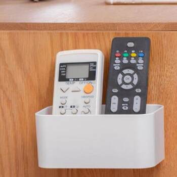 Key storage box on the door shoe cabinet air conditioning remote control nail-free sticking wall-mounted simple household wall