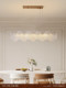Feiduo French-Style Light Luxury Restaurant Chandelier 2025 New Model High-End Cream-Style Glass Atmospheric Petal Lamp