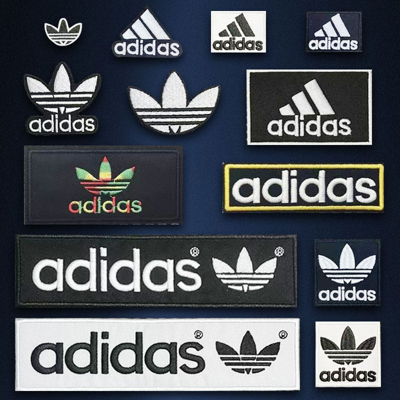 クローバーの刺繍ロゴが入った新しいスポーツウェア。アイロンで縫い付けたバッジ、穴を補修するためのパッチワーク、そしてトレンディな刺繍が特徴です。