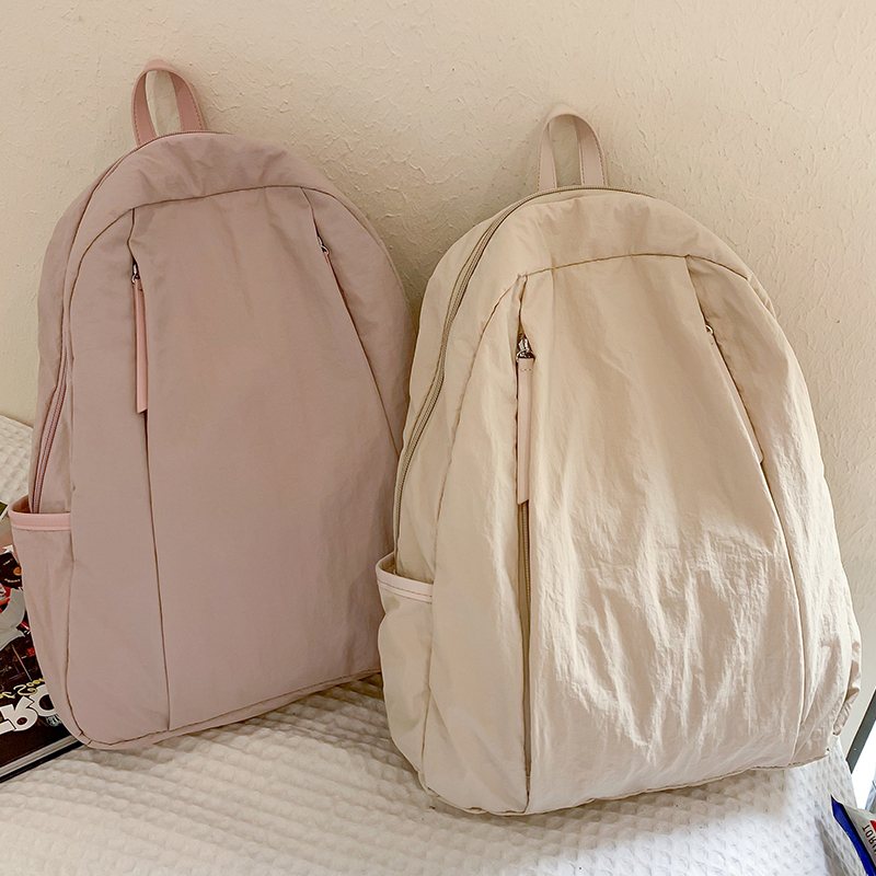 啄木鸟轻便双肩包女小众新款大学生通勤纯色书包旅行便捷休闲背包