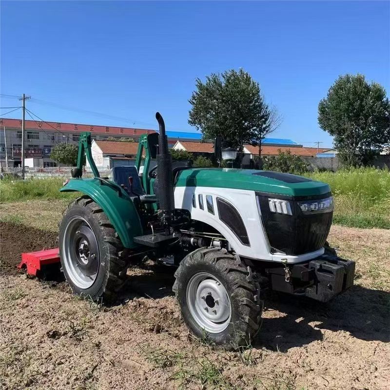 Four-Wheel Drive Multifunctional Agricultural Tractor for Irrigation and Drainage, Greenhouse Use, Diesel-Powered, High-Horsepower, Wheeled, Dual-Purpose Four-Wheel Rotary Tiller Four-Wheel Drive Multifunctional Agricultural Tractor for Irrigation and Drainage, Greenhouse Use, Diesel-Powered, High-Horsepower, Wheeled, Dual-Purpose Four-Wheel Rotary Tiller