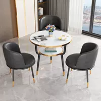 Темно-серый стол и три стула