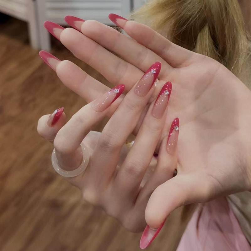 Purely Handmade Rose-Red French-Style Nail Art with Rhinestones, 2026 New Model, High-End Mid-Length Almond Nails That Enhance Complexion Purely Handmade Rose-Red French-Style Nail Art with Rhinestones, 2026 New Model, High-End Mid-Length Almond Nails That Enhance Complexion