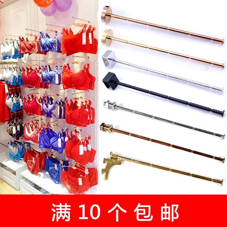 Underwear underwear bra shop shows the lingerie wall wall pipe pipe hole on wall wall pipe dark hook bamboo rod