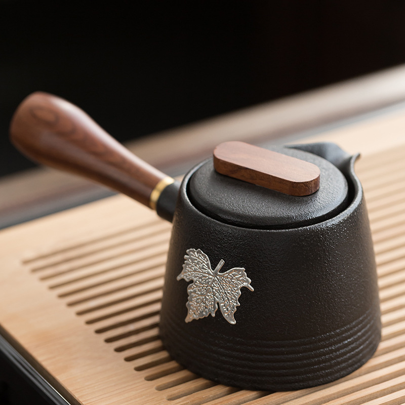 Black pottery teapot side handle pot single pot ceramic inlaid tin wood handle teapot Japanese antique pot stone scoop pot heat-resistant tea set