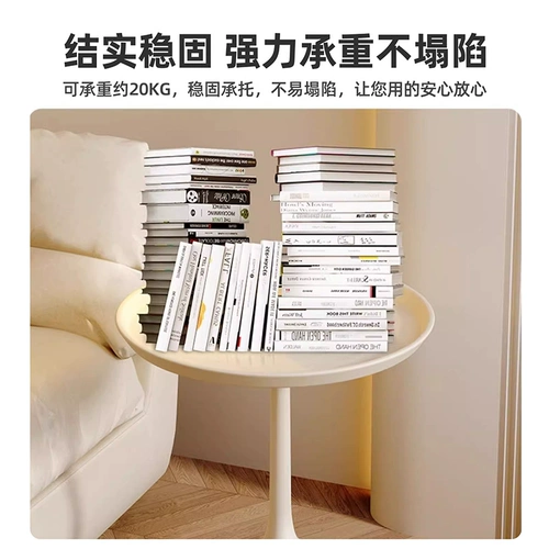 Гостиная, диван, шкаф, несколько балконных полок, светлый роскошный маленький журнальный столик, прикроватный столик, прикроватная тумбочка для спальни, креативный маленький круглый столик