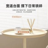 Гостиная, диван, шкаф, несколько балконных полок, светлый роскошный маленький журнальный столик, прикроватный столик, прикроватная тумбочка для спальни, креативный маленький круглый столик