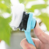 Собака расчесала кошачья кисть для домашних животных щетка