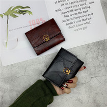 2021 new Korean version of the tide wallet womens short retro Hong Kong style folding small wallet simple buckle card bag coin purse