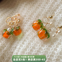 Thinking of the persimmon wishes your heart a matter of thought to be a persimmon a tray ear clip without earrings earrings for a small crowdwoman