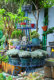 ພາຍນອກດຽວອາເມລິກາ retro ເກົ່າທາດເຫຼັກກາງແຈ້ງ rust-proof ຫຼາຍຊັ້ນດອກຢືນສວນ villa courtyard sundries flower pot rack
