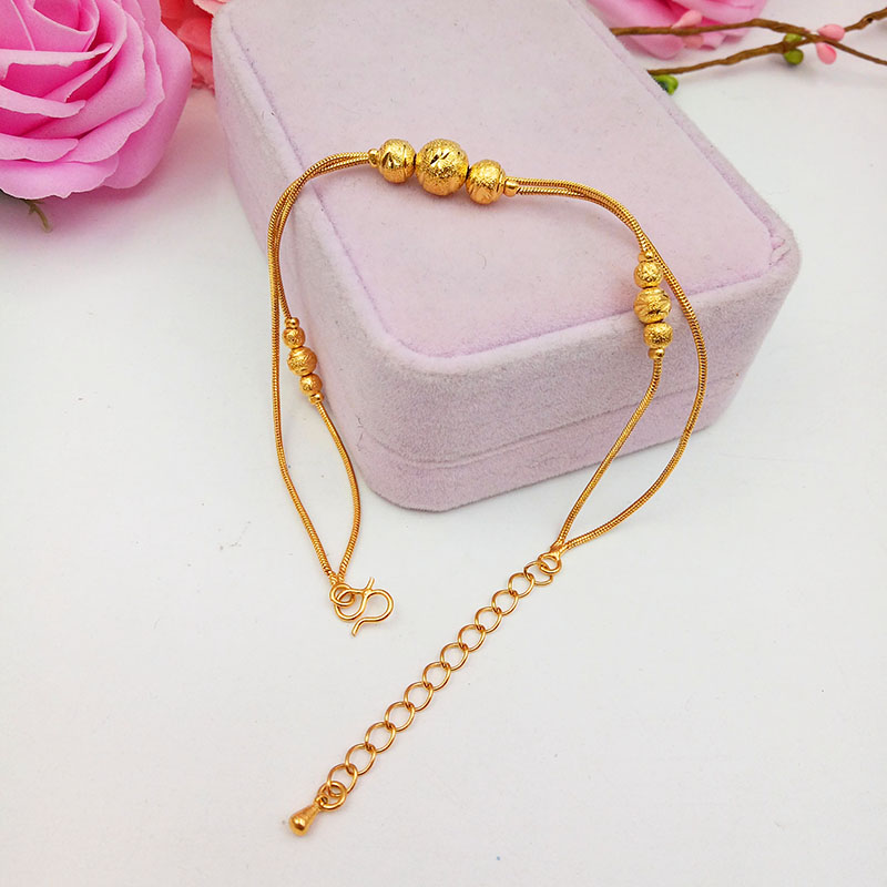 Vòng chân vàng cát hoang dã mới của nữ Nhật Bản và Hàn Quốc giả vàng có thể được điều chỉnh mạ vàng đồng xu vàng chuyển hạt trang sức lâu không phai lắc chân nữ